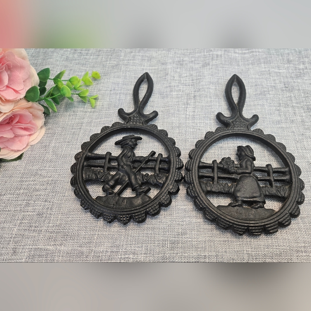 Vintage Dalecraft Set of 2 Amish Man & Woman Cast Iron Trivets 8 1/2"